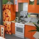 Апельсины на холодильнике